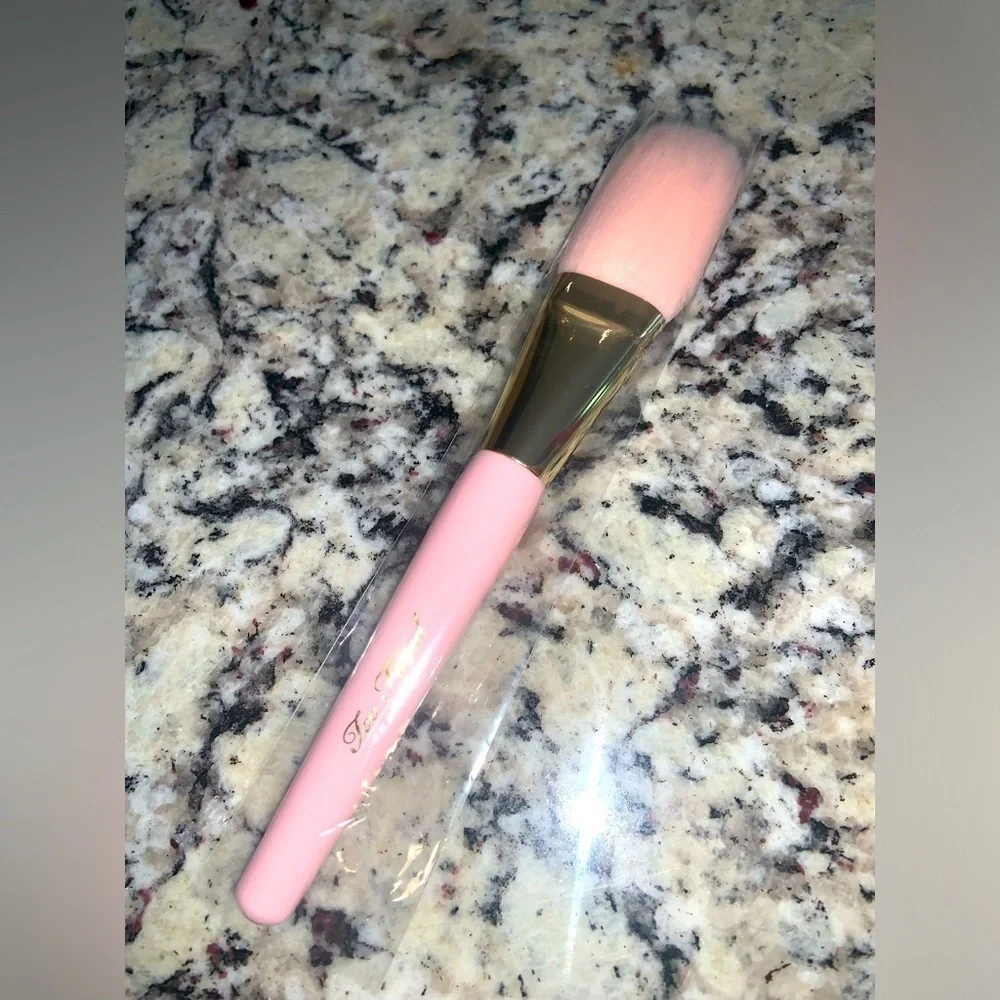 New too faced powder brush 45$